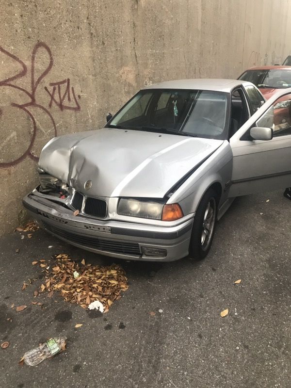 BMW 1996 328i still runs after I got hit in the side over hearts that's about it still good to fix or for parts BMW 90s era parts are hard to come