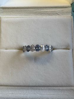 Platinum / moissanite eternity ring