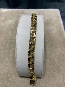 18KT Gold Charm Bracelet