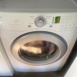 White LG Dryer And White Whirlpool Washer 