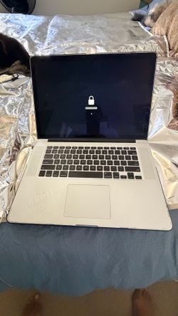 2014 MacBook Pro 15 inch retina, display locked…