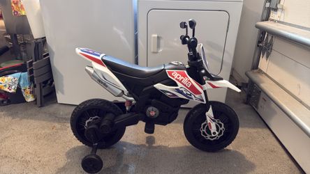 Kids electric motorcycle with training wheels