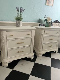 Pair of White Ornate Nightstands with Gold Hardware