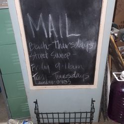 Chalkboard sign with basket