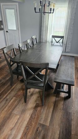 Kitchen table seats 12 comes w 2 boxed up new chairs