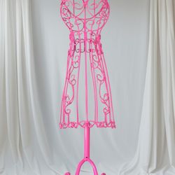 Vintage pink metal mannequin jewellery stand