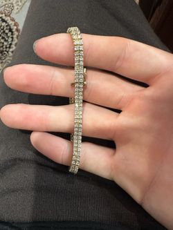 14k yellow gold 2 row natural diamond tennis bracelet!