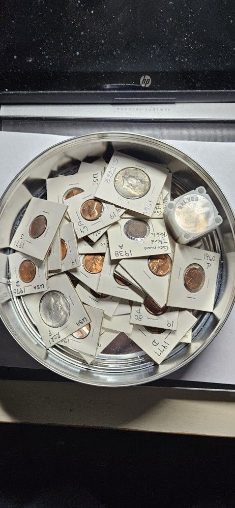 Mixed Set Of Coins In Cookie Can