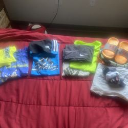 boys clothes size 6/7 some 5/6 and brand new slides size 11 
