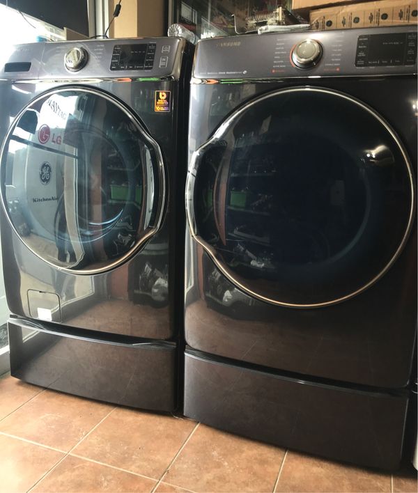 Brand new front load Samsung washer and dryer grey color heavy duty for