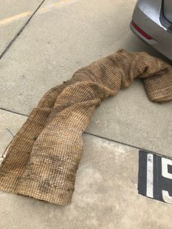 Very large used burlap rug