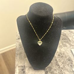 Gold tone heart pendant necklace