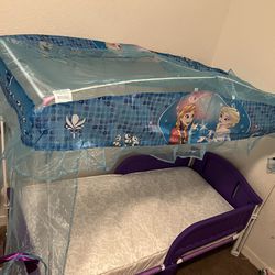 Elsa Toddler Canopy Beds. Brand New. And 1 brand new mattress.