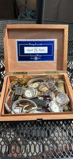 Watches in a cigar box