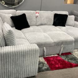 Sectional Sleeper Available In Black And Brown