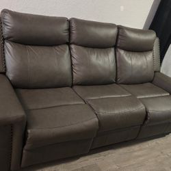 Reclining "Leather" Sofa And Loveseat