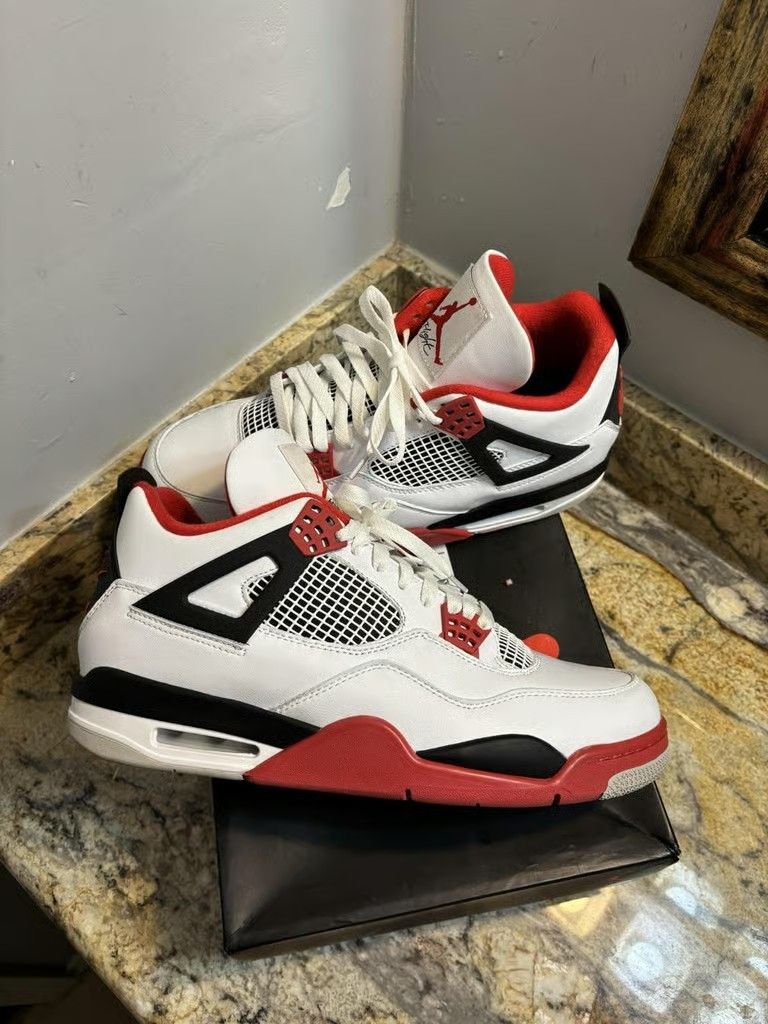 Men's sports shoes and sneakers are red and black