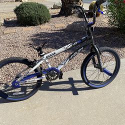 Blue Ambush Bike With Black Helmet