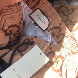 Gucci swim shorts/check description
