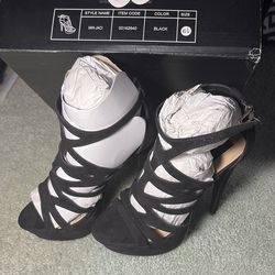 New size 6 1/2 black strappy heels