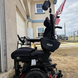 Electric motor wheelchair
