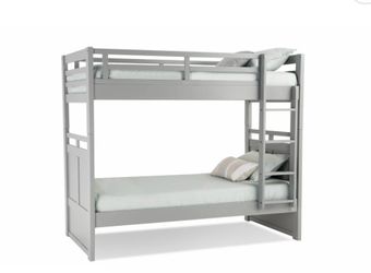 Twin/twin bunk bed in good condition with one mattress