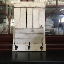 decorative piece with hooks