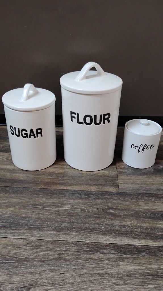 Utility Stoneware Kitchen  Ceramic Canisters (3 pieces)
10"HX6.75"D
8"HX5.75"D
5"HX4.75"D

