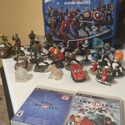lot of 21 Disney infinity figures, portal, 2 PS3 video games and carrying case 