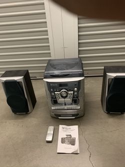 Encore technology turntable ,CD and dual cassette, along with AM/FM radio with two speakers
