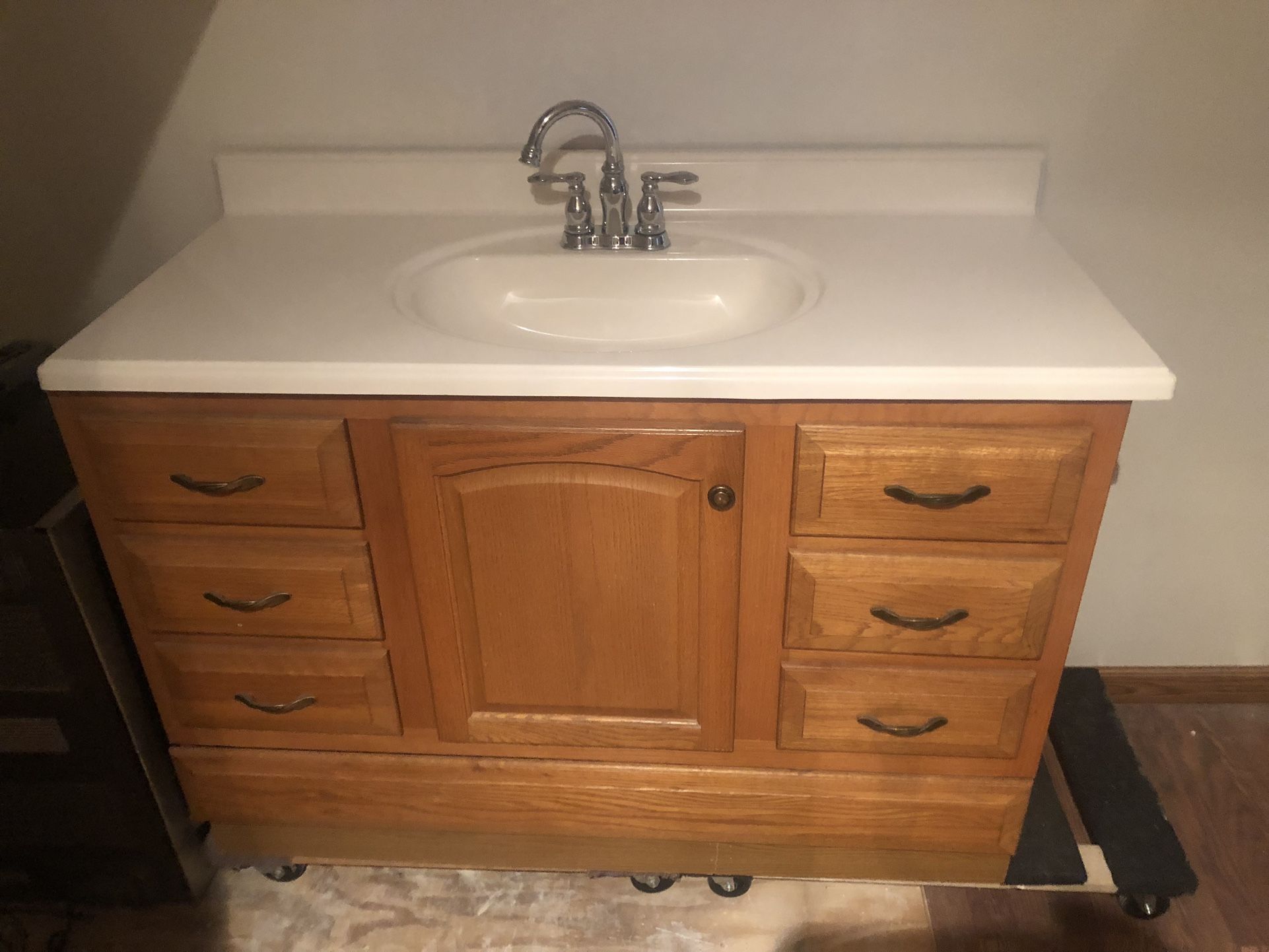 48” Oak Vanity With Solid Surface Top And Faucet
