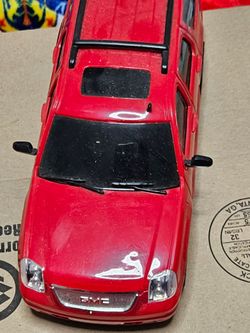 Red GMC Denali Toy SUV