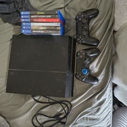 Used PS4, comes with 6 games, 2 controllers, and power cord.