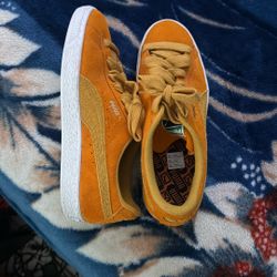 Orange Pumas Size 10