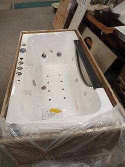 White Whirlpool Jetted Bathtub
