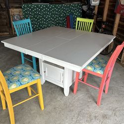 Wood Table with Leaf. 4 Chairs& Bench. 