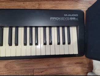 M-Audio ProKeys 88sx Keyboard performance piano Used with some coloration on keys all working good One cable and couple pin and power adapter shown i