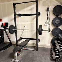 Fold-in wall-mounted rack with bench and accessories