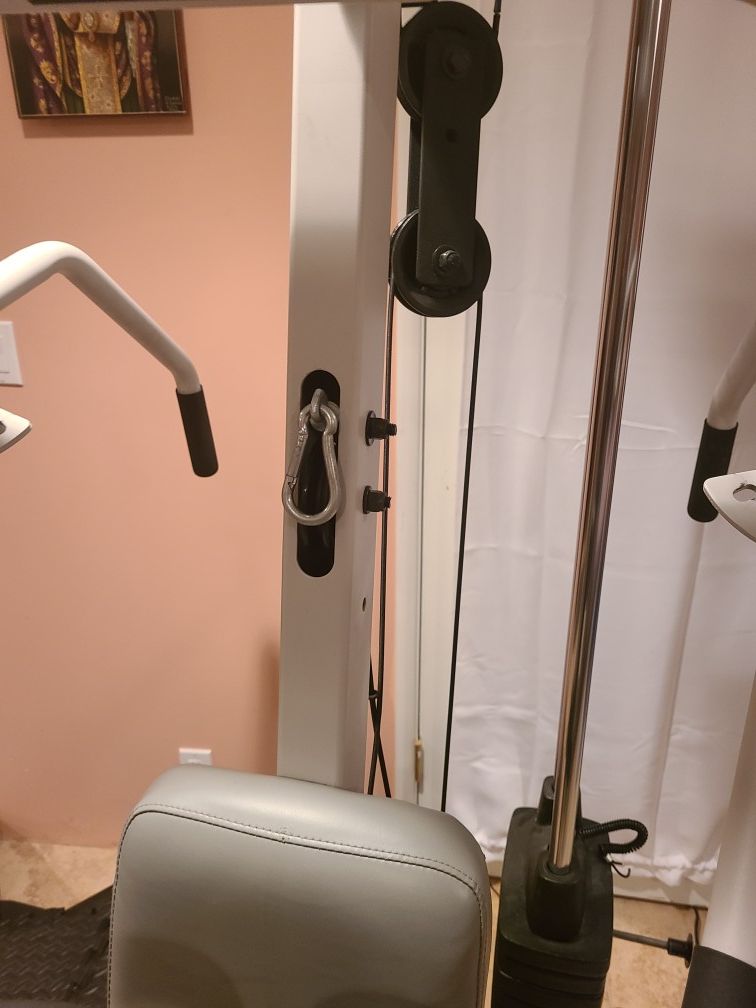 Precor Zuma Home Gym 200 pounds in weight with increments of 10. Lat