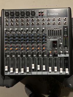 2 15loudspeaker peavey and mackie mixer