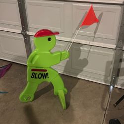 Almost New. Slow Guy Sign 