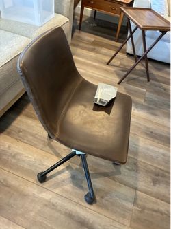 New Ashley furniture desk chair. Leather adjustable.