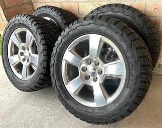 Chevy Texas Edition OEM 20s Wheels On Mud Terrain 33s Tires.