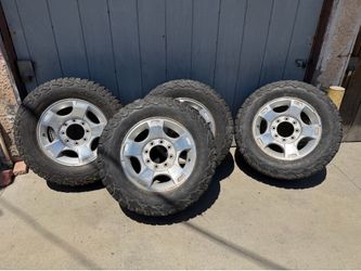 Some 18” rims with tires 275/65 R18