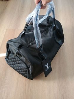 Brand new duffle bag with shoe pocket