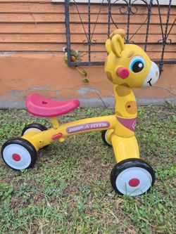 Radio flyer giraffe ride on for kids..See All The Pictures