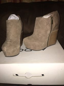 Aldo’s Daby wedged booties