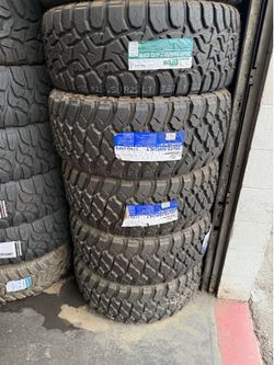 35X13.50R24 SET OF 4 MUD TIRES WITH INSTALLATION AND BALANCING