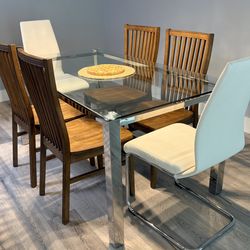Glass Dining room Table With Two White Chairs