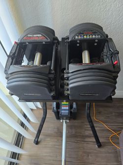Powerblock Pro Series with Knurled Grip Handles and Stand, and Straight Bar.Price is Firm. Yes It is still available